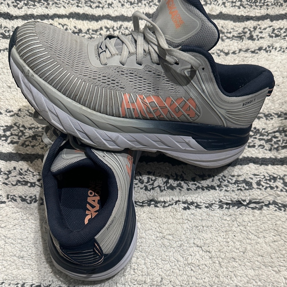 Hoka Gray and Navy Athletic Shoes with Orange Accents
